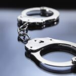 close-up-of-metal-handcuffs-150638685-5b1ddf908e1b6e003627e844