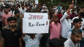 Competitive-students-taking-out-candle-march-in-Prayagraj-1780064366718_m