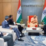 UP CM Yogi Adityanath interacts with dignitaries during the inauguration of SEMICON India 2024