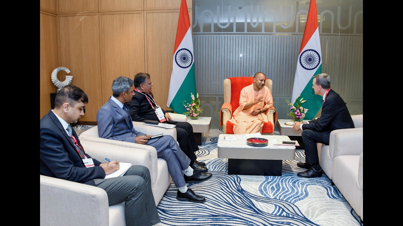 UP CM Yogi Adityanath interacts with dignitaries during the inauguration of SEMICON India 2024